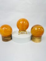 Orange calcite crystal sphere 40mm