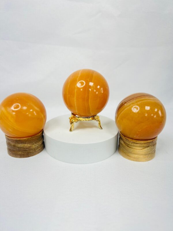 Orange calcite crystal sphere 40mm